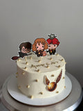 Cake with Harry Potter-themed toppers